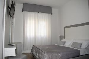 Postel nebo postele na pokoji v ubytování Hotel Edelweiss
