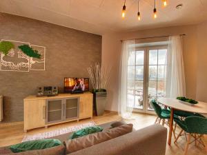 Kuchyňa alebo kuchynka v ubytovaní Apartamenty Paszkówka