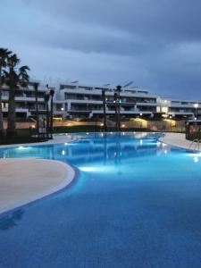 Bazén v ubytování Casa Holiday Finestrat - 3 bedroom flat with common pool nebo v jeho okolí