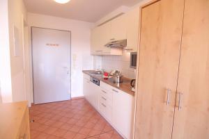 Köök või kööginurk majutusasutuses Ferienwohnung Sinnewyn