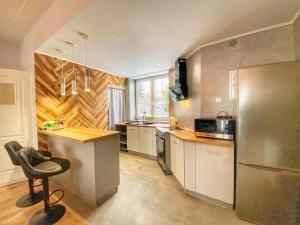 Kuchyňa alebo kuchynka v ubytovaní Apartamenty Paszkówka