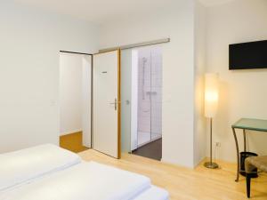 Katil atau katil-katil dalam bilik di Hotel Baders Krone