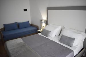 Postel nebo postele na pokoji v ubytování Hotel Edelweiss