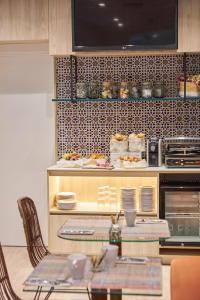 Kuchnia lub aneks kuchenny w obiekcie U-Sense Sevilla Centro