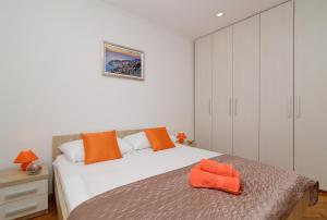 Posteľ alebo postele v izbe v ubytovaní Dubrovnik Hill Apartments