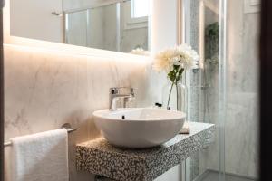 Koupelna v ubytování Romagna Suite Hotel