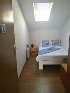 Postel nebo postele na pokoji v ubytování Uphill Opatija Apartment