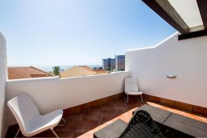 Posedenie v ubytovaní GO2TENERIFE Apart'Manon Duplex w/ Solarium, pools & sea view