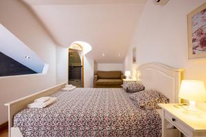 Posteľ alebo postele v izbe v ubytovaní GO2TENERIFE Apart'Manon Duplex w/ Solarium, pools & sea view
