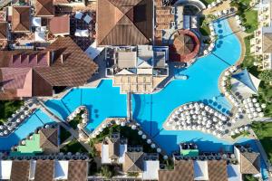 an aerial view of the resort buildings and the water at Atlantica Aeneas Resort in Ayia Napa