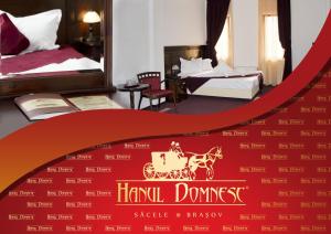a hotel room with a red sign with a horse on it at Hanul Domnesc in Braşov