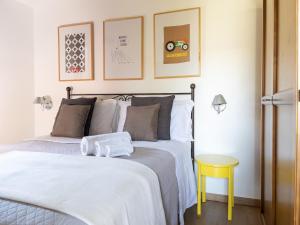 Postel nebo postele na pokoji v ubytování Agriturismo La Valle Di Vico