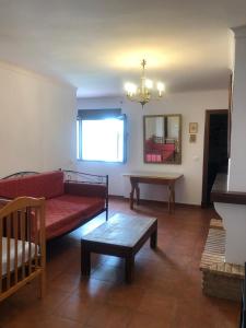 Posteľ alebo postele v izbe v ubytovaní Casa de Tita Dolores