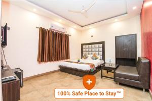 Postel nebo postele na pokoji v ubytování FabHotel De Sivalika - 500m from Belur Math
