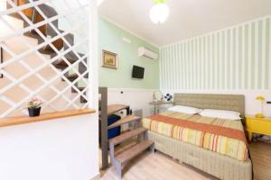 Postel nebo postele na pokoji v ubytování Extravacanza Porto