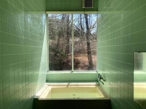 Fotografie z fotogalerie ubytování Bellscabin Guesthouse v destinaci Karuizawa + 37 fotografií