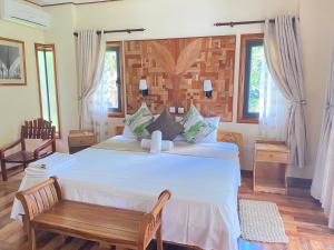 Postel nebo postele na pokoji v ubytování Calou Guest House