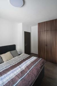 Tempat tidur dalam kamar di Apartmán Lúčnica