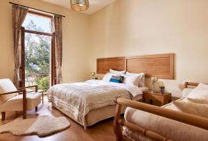 Cama o camas de una habitación en Aktaion Hotel