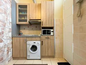 Kuchyňa alebo kuchynka v ubytovaní ABT Apartments