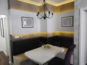 Posedenie v ubytovaní Zoé Apartman