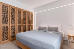 A bed or beds in a room at Villa Calma
