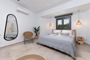 A bed or beds in a room at Villa Calma