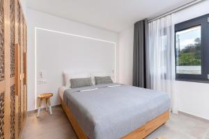 A bed or beds in a room at Villa Calma