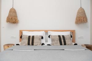 A bed or beds in a room at Villa Calma
