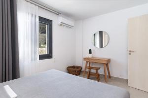 A bed or beds in a room at Villa Calma