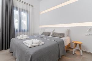 A bed or beds in a room at Villa Calma