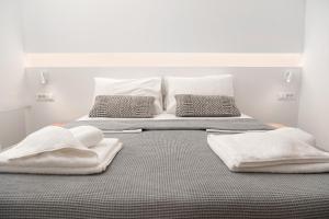 A bed or beds in a room at Villa Calma