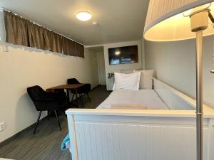 Voodi või voodid majutusasutuse Vid Gekås Ullared Boende B&B toas