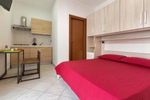 Ein Bett oder Betten in einem Zimmer der Unterkunft Villetta Enea by BarbarHouse