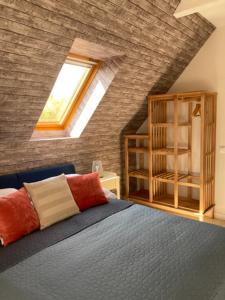 Postel nebo postele na pokoji v ubytování Levendula Apartman