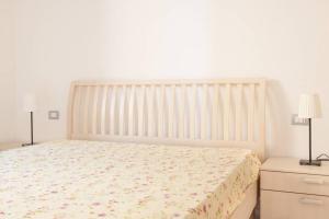 A bed or beds in a room at Ultrapanoramica a Costa Paradiso