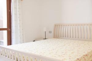 A bed or beds in a room at Ultrapanoramica a Costa Paradiso