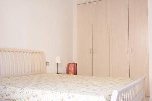 A bed or beds in a room at Ultrapanoramica a Costa Paradiso