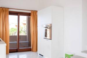 A bed or beds in a room at Ultrapanoramica a Costa Paradiso