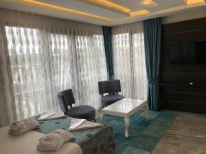TV a/nebo společenská místnost v ubytování Venus Hotel