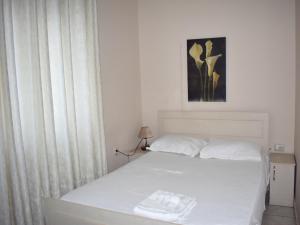 Postel nebo postele na pokoji v ubytování Hotel Central