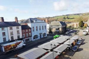 an aerial view of a town with buildings and a street at Cosy, elegant apartment in heart of Ludlow Town in Ludlow