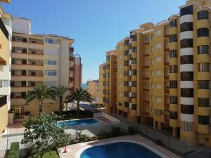 a view from the balcony of the apartment buildings at Tamaris Playa Solo Familias Serviplaya in Playa de Xeraco