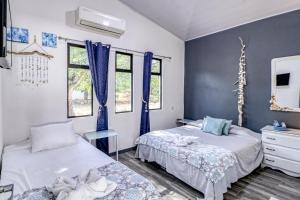 Voodi või voodid majutusasutuse Casa Conchas toas