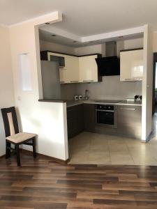 Kuchyňa alebo kuchynka v ubytovaní Apartament Tuwima