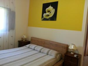 Postel nebo postele na pokoji v ubytování B&B Villa Pia