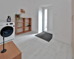 TV a/nebo společenská místnost v ubytování Apartments near the pond