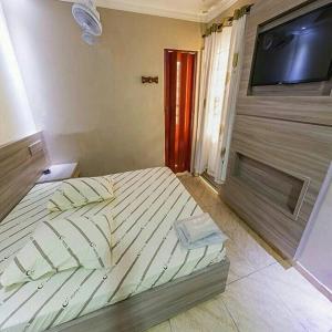 Letto o letti in una camera di Hotel Flex In