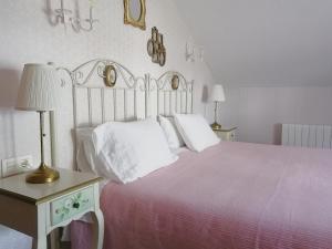 Postel nebo postele na pokoji v ubytování Casona Del Duende