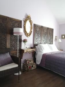Postel nebo postele na pokoji v ubytování Casona Del Duende + 37 fotografií